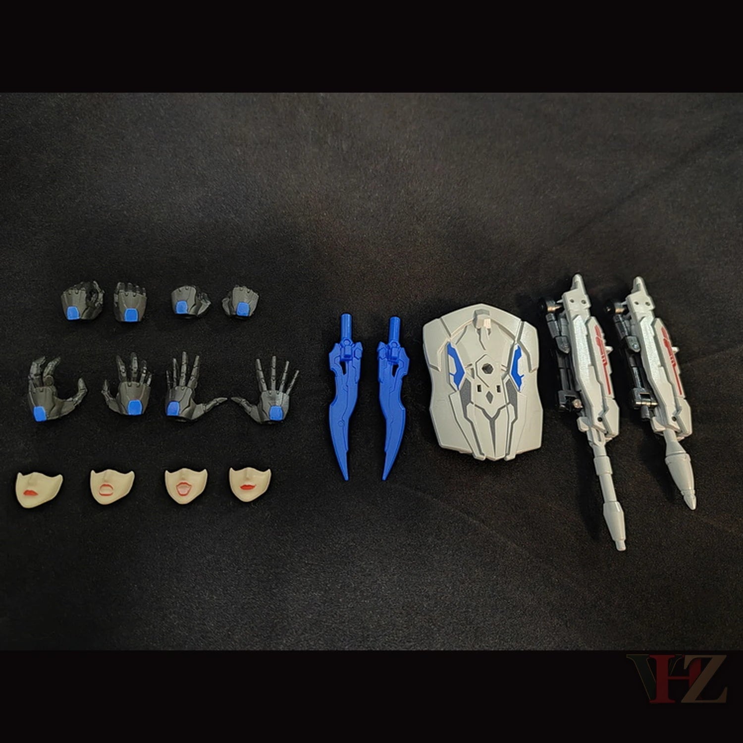 Accessories for Collection Space CS-03 Starqueen Starscream Mecha Girl: hands, facial expressions, blue daggers, gray shield, dual blasters on black surface.