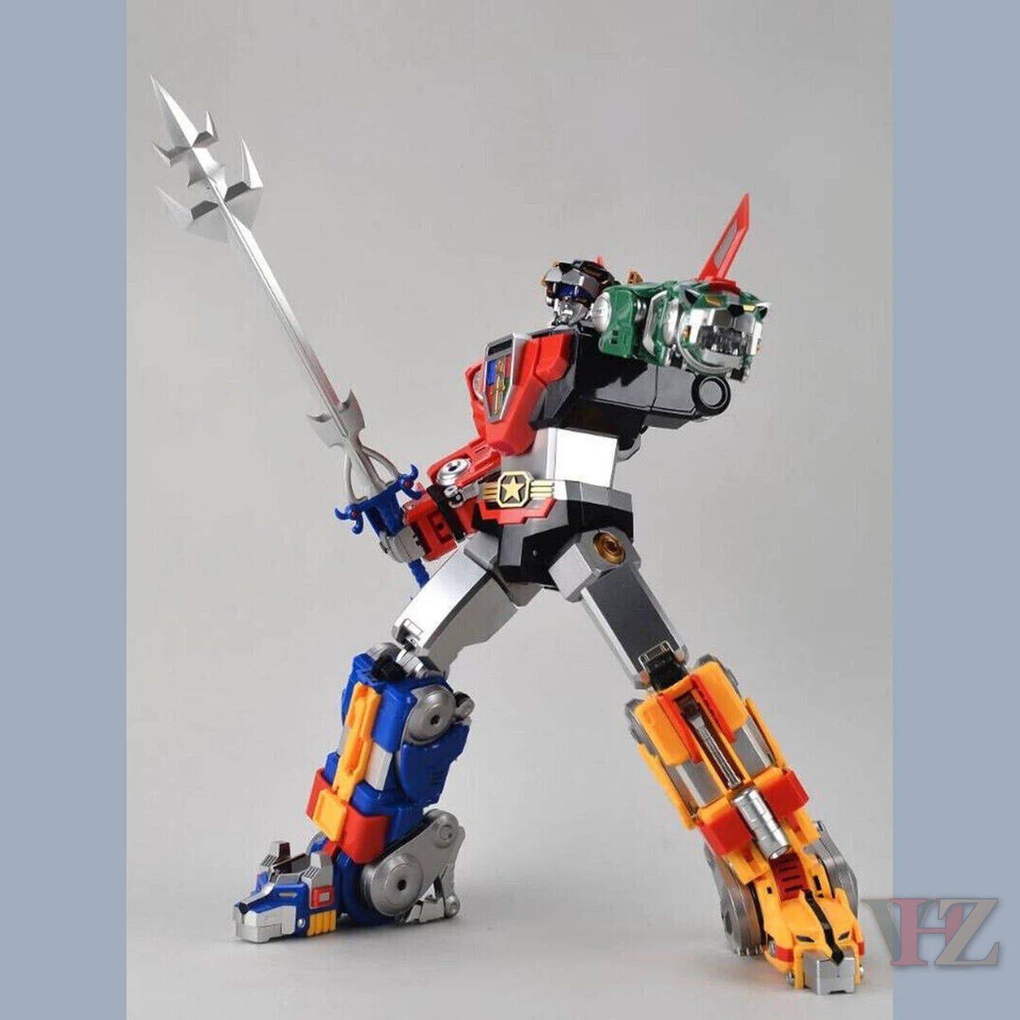 Multicolored Voltron action figure reissue with silver trident weapon - Vilo Hobby Zone