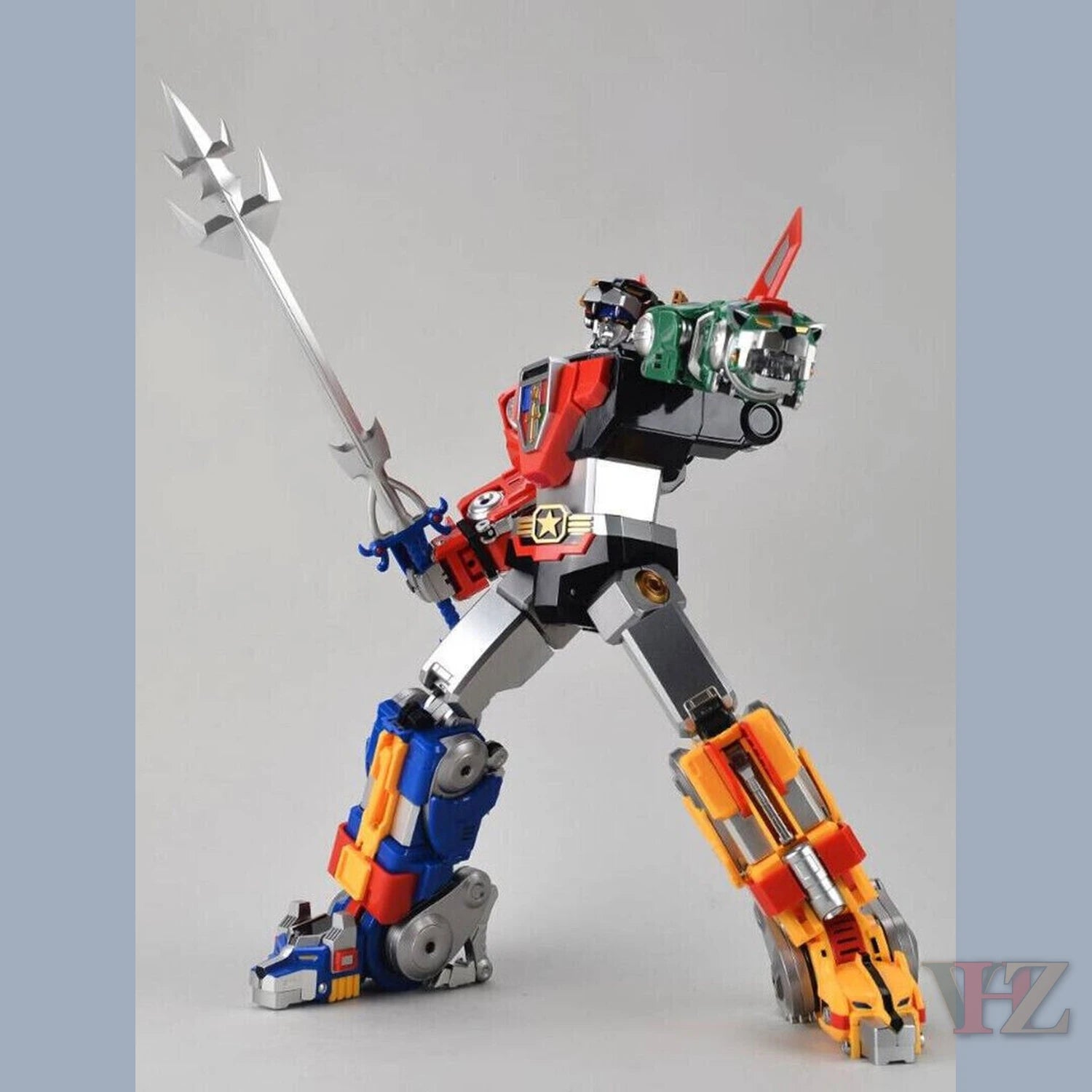 Multicolored Voltron action figure reissue with silver trident weapon - Vilo Hobby Zone